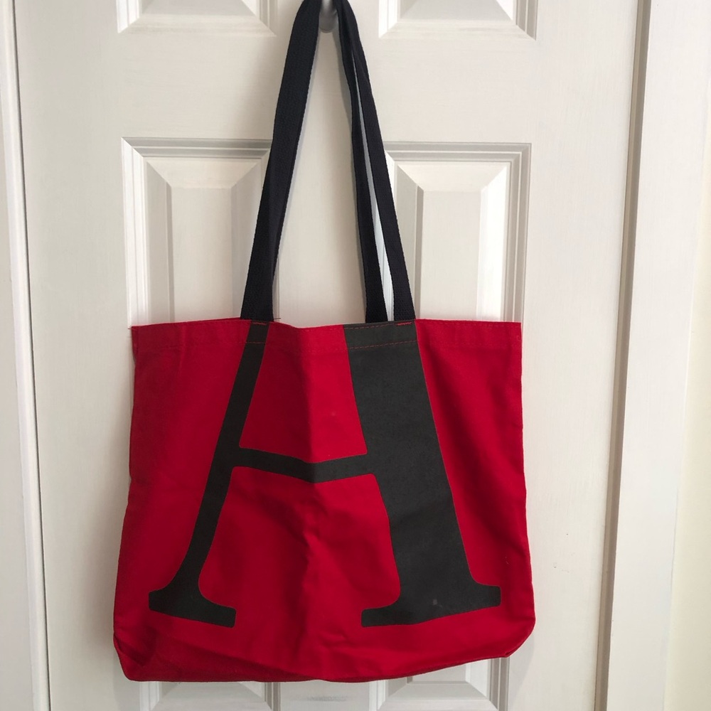 Red Tote Bag with Large Black 'A' Graphic